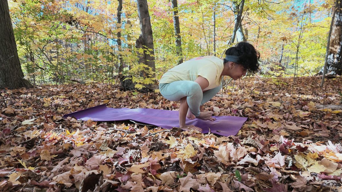 Sneh Lata balancing in crow pose