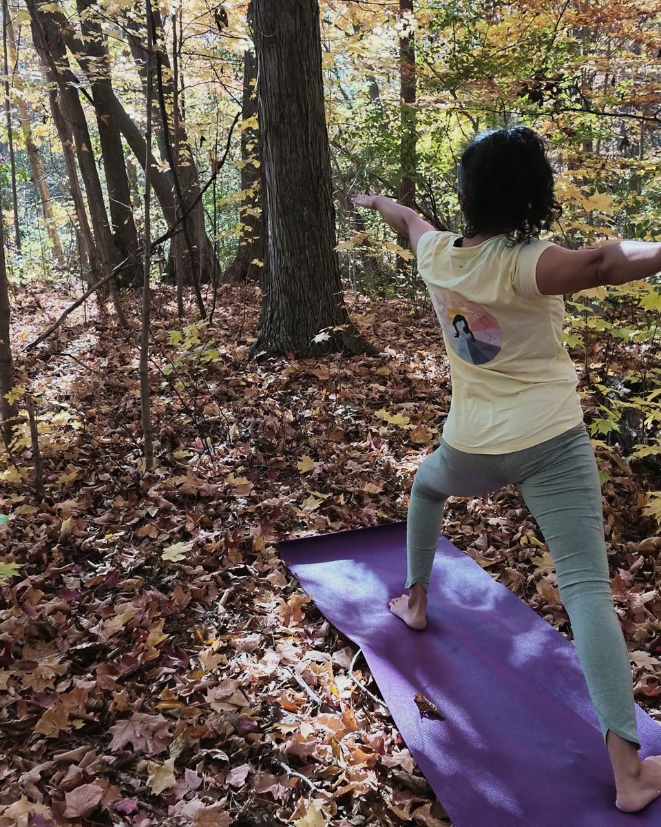 Sneh Lata in a warrior pose with arms extended